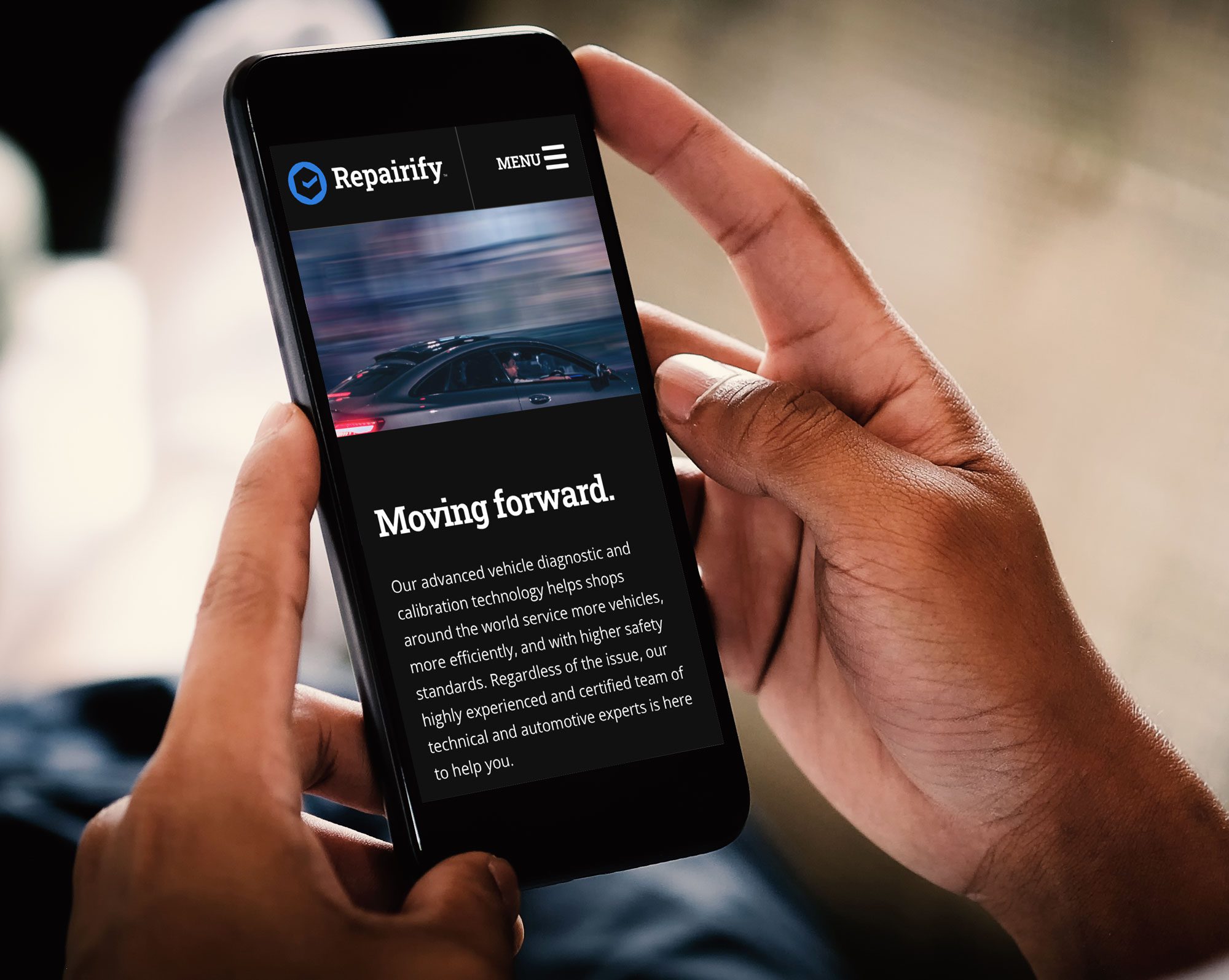 hands holding phone and browsing Repairify UK website
